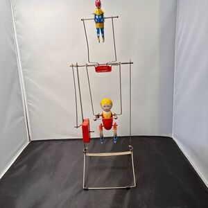 SCHYLLING TIN WIND UP TIK TAK ACROBOAT TOY